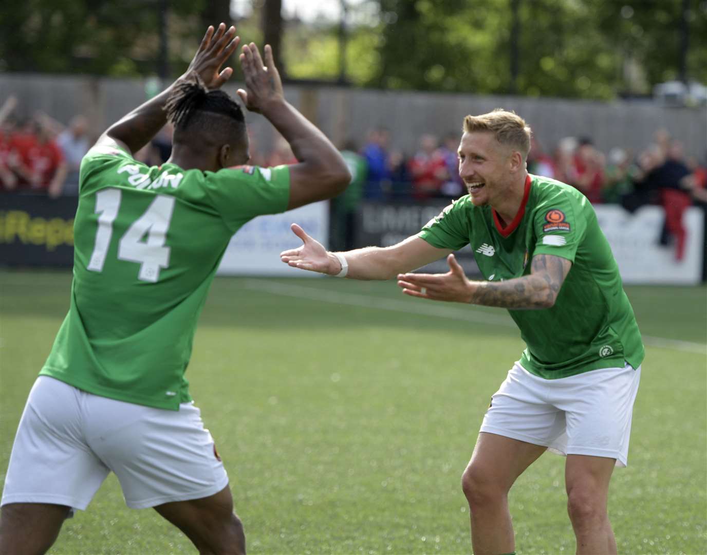 Substitutes Dominic Poleon and Lee Martin celebrate after Craig Tanner put the Fleet 2-1 ahead. Picture: Barry Goodwin