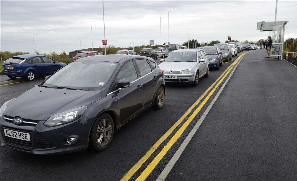 Cars queuing to get in John Lewis