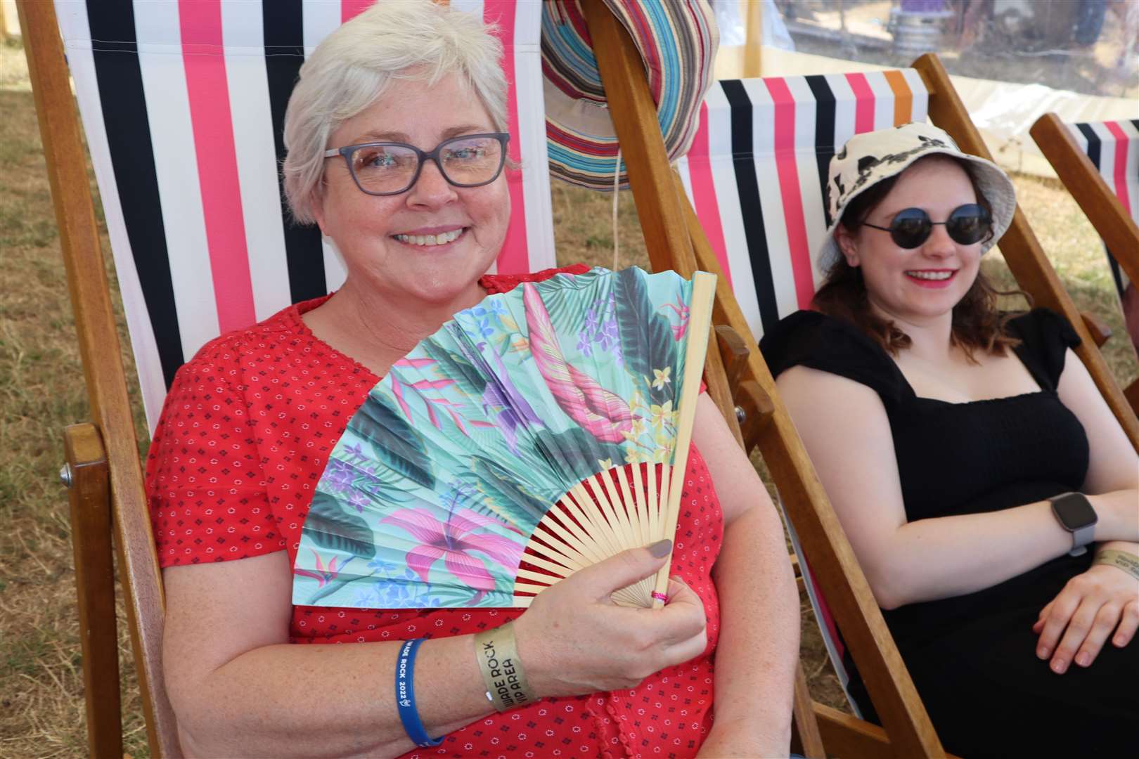 Alison Tolson from Herne Bay cooling down as she waits to see her friend Mandy Shields performing in Echo 90 at Iwade Rock