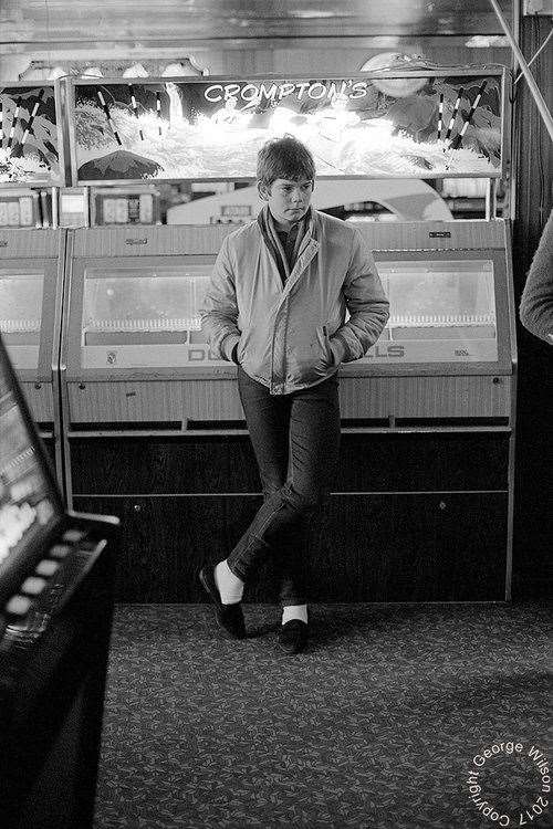 Not many can pull off black shoes and white socks, but this young lad gave it a go. Copyright: George Wilson