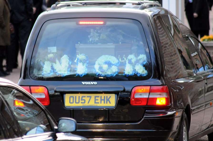 Flowers spelling out Nick for tragic student Nick Dean