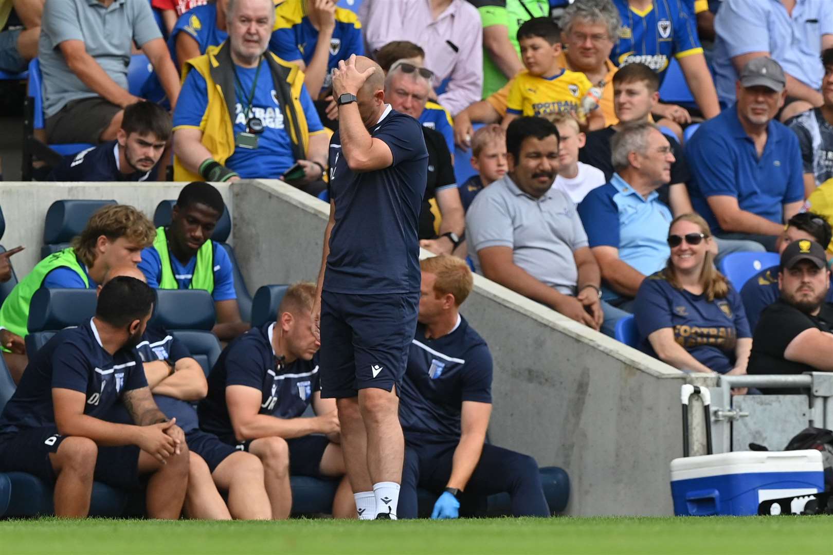 Gillingham assistant David Livermore on the touchline for the game at AFC Wimbledon Picture : Keith Gillard