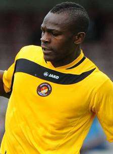 Ebbsfleet player Patrick Ada (in yellow) pictured in a match against Lincoln. Picture: John Jenkins Lincolnshire Media Ltd