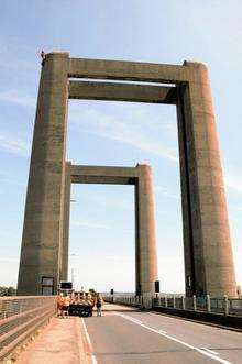 A workman scales one of the Kingsferry bridge supports Picture: Barry Crayford