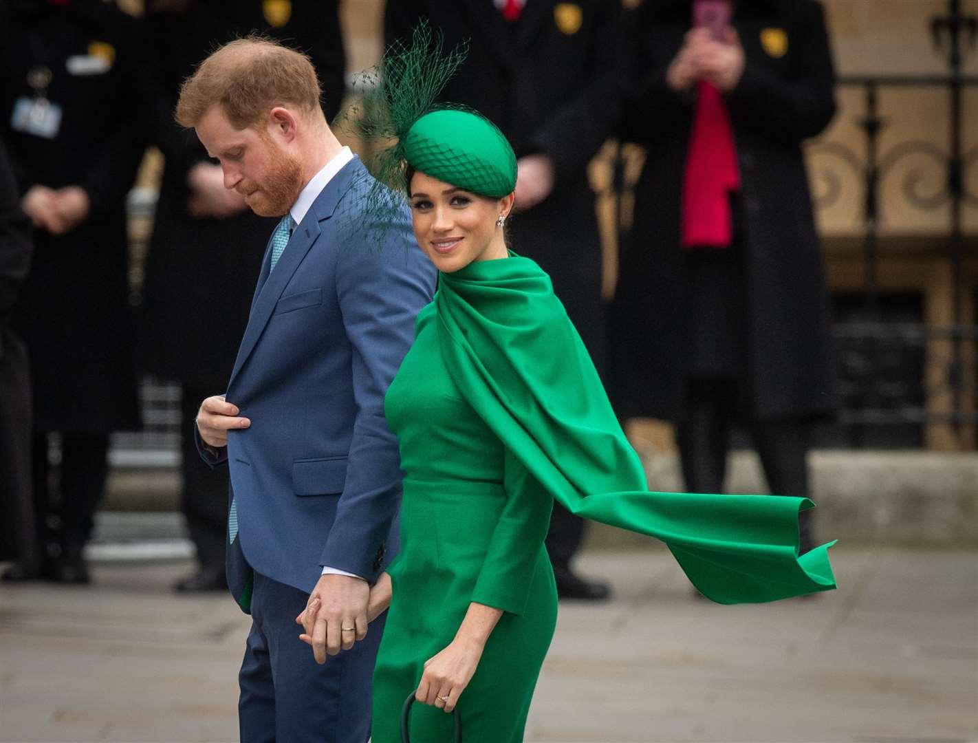 Harry and Meghan on their last official public engagement before stepping down from royal duties (Dominic Lipinski/PA)