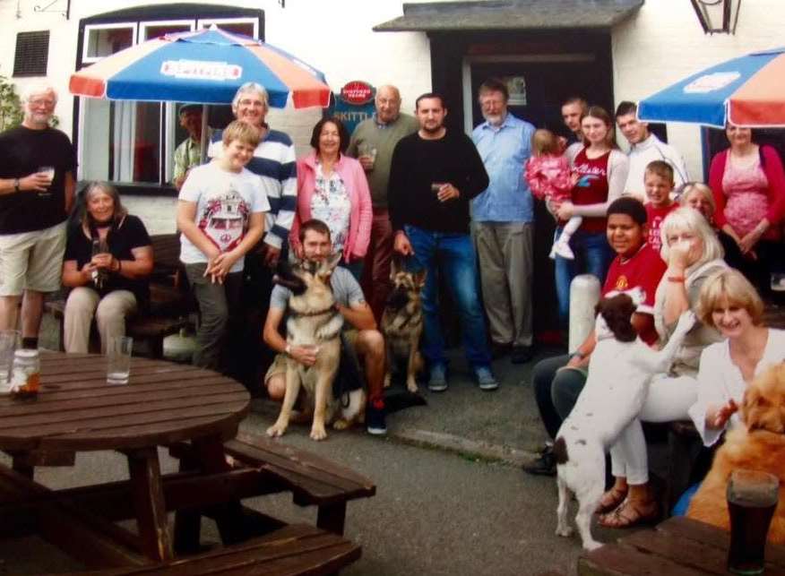 The Bricklayer's Arms Action Group outside the pub