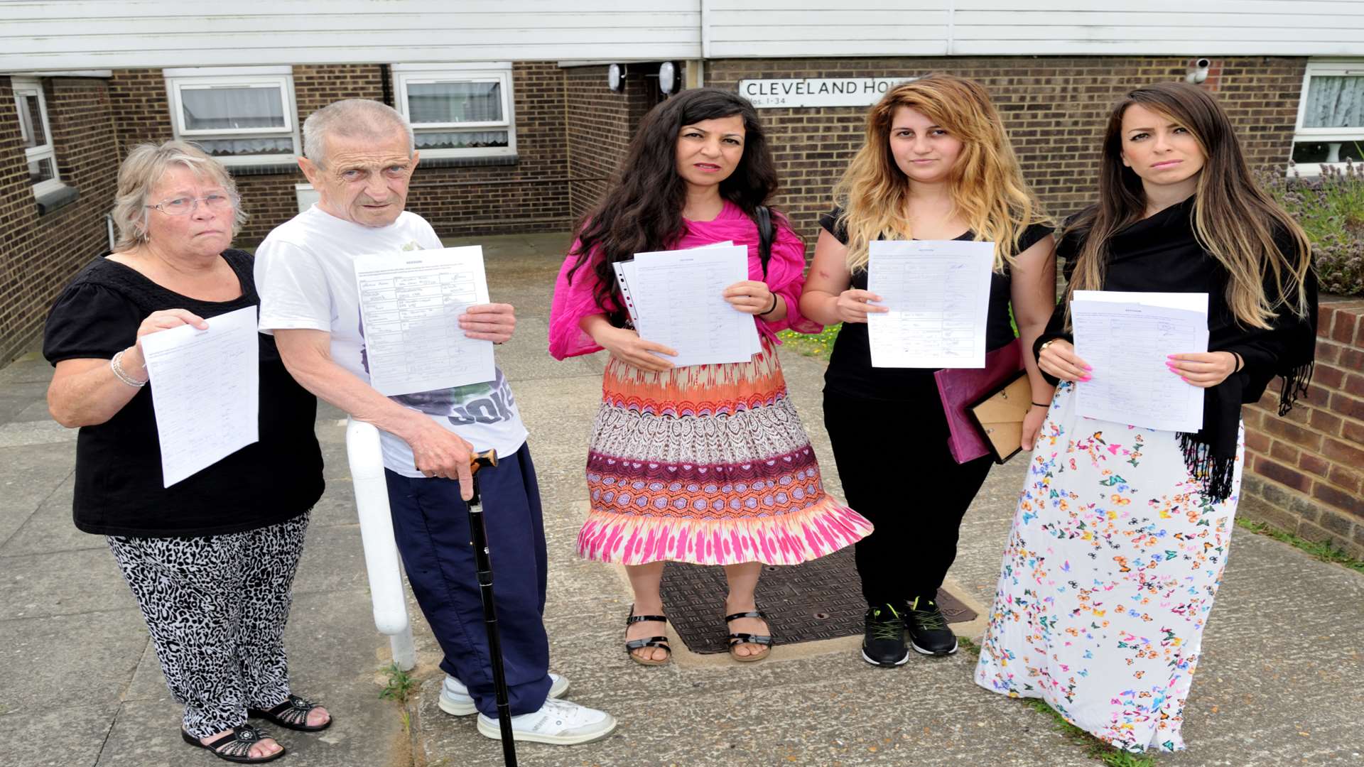 Pakize on the road side with her petition L/R, Gillian Videan, Peter Winter, Pakize Guvenc, Ebru Simsek, Ayca Guvenc.