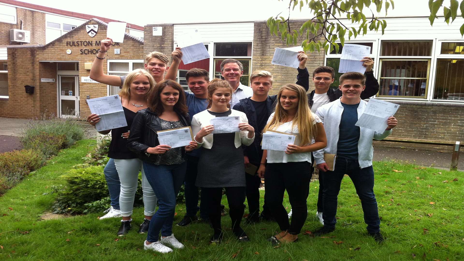 Head teacher Alan Brookes with students