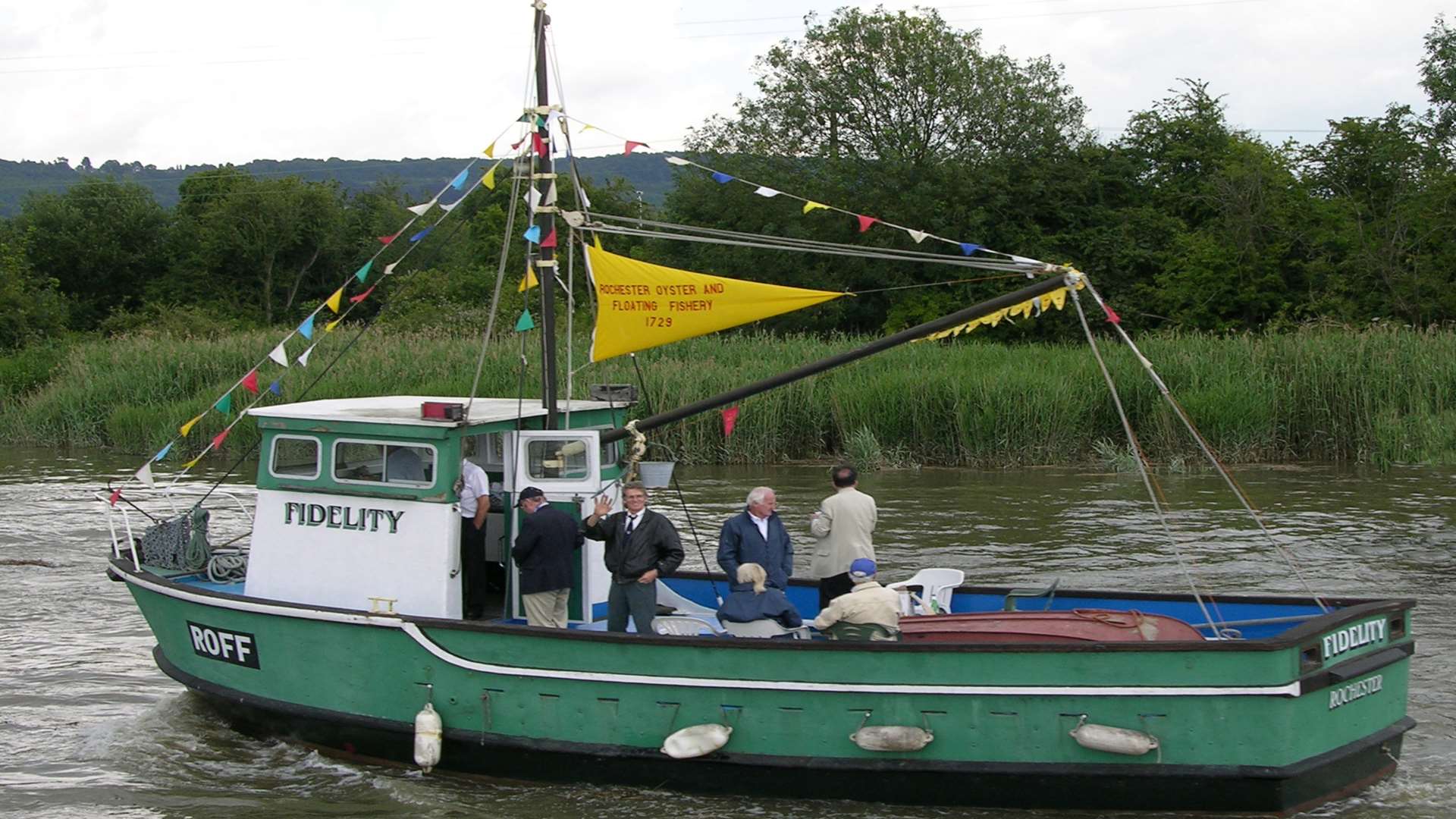 Steve Trice (waving) on board a local fishing boat - this is the last picture taken of him. Picture: Fred Trice.