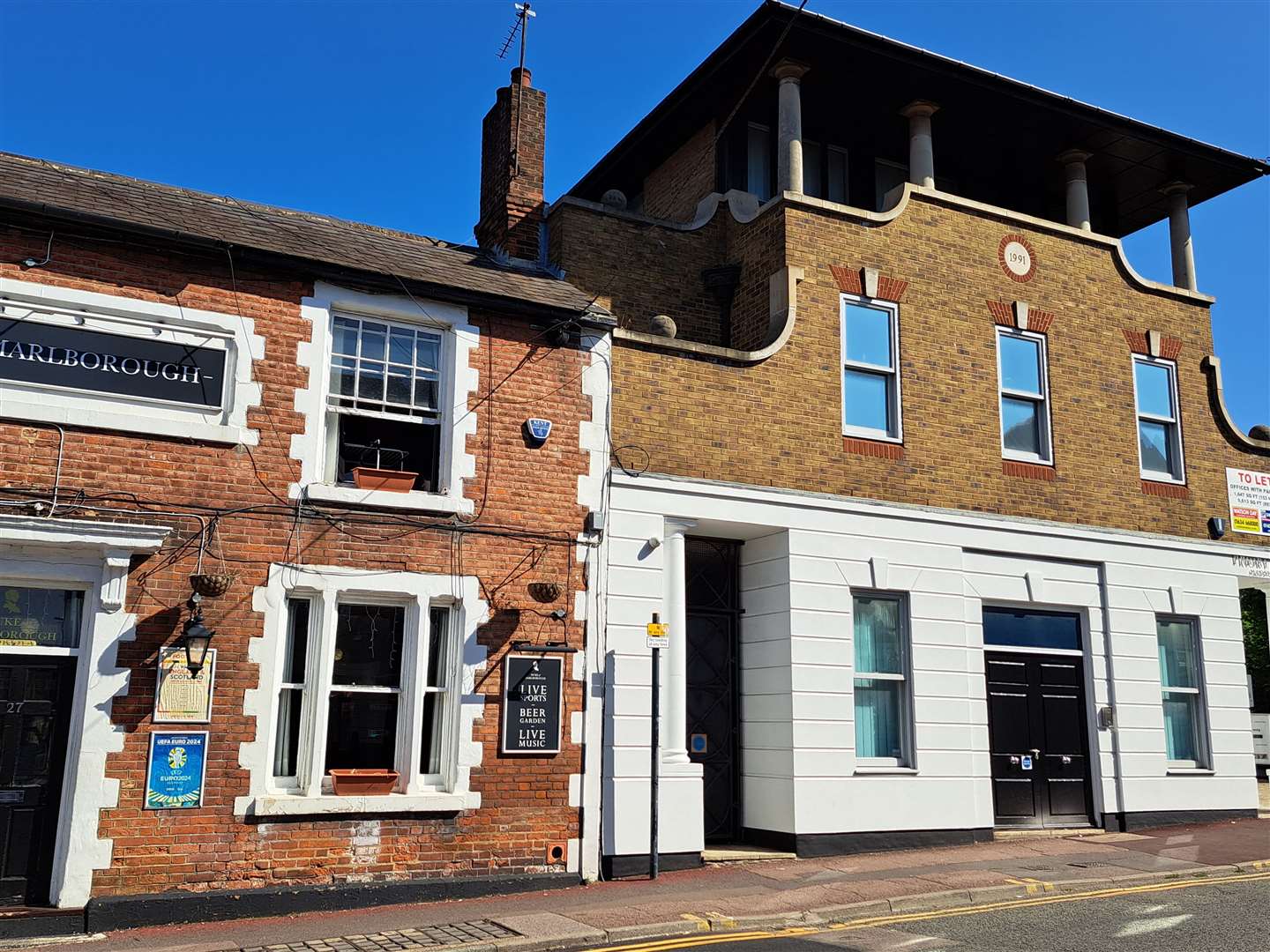 Priory Gate is next to the Duke of Marlborough pub