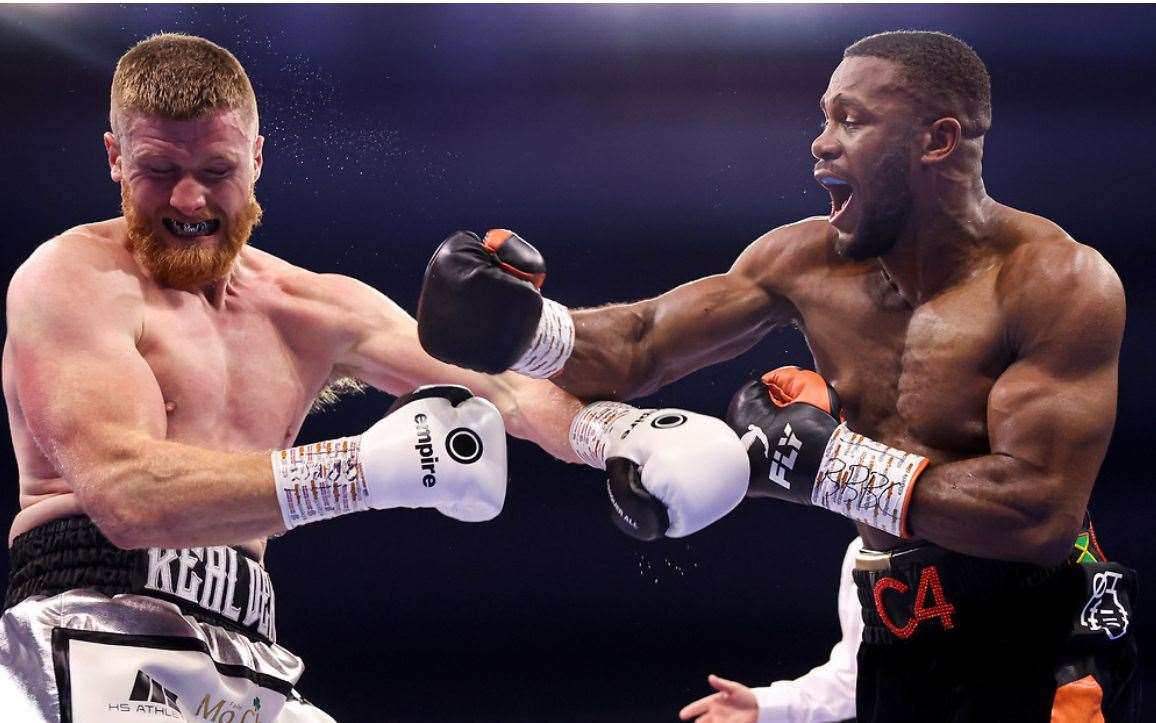 Cheavon Clarke with a big hit against David Jamieson in their Final Eliminator British Cruiserweight Title fight Picture: Matthew Pover/Matchroom