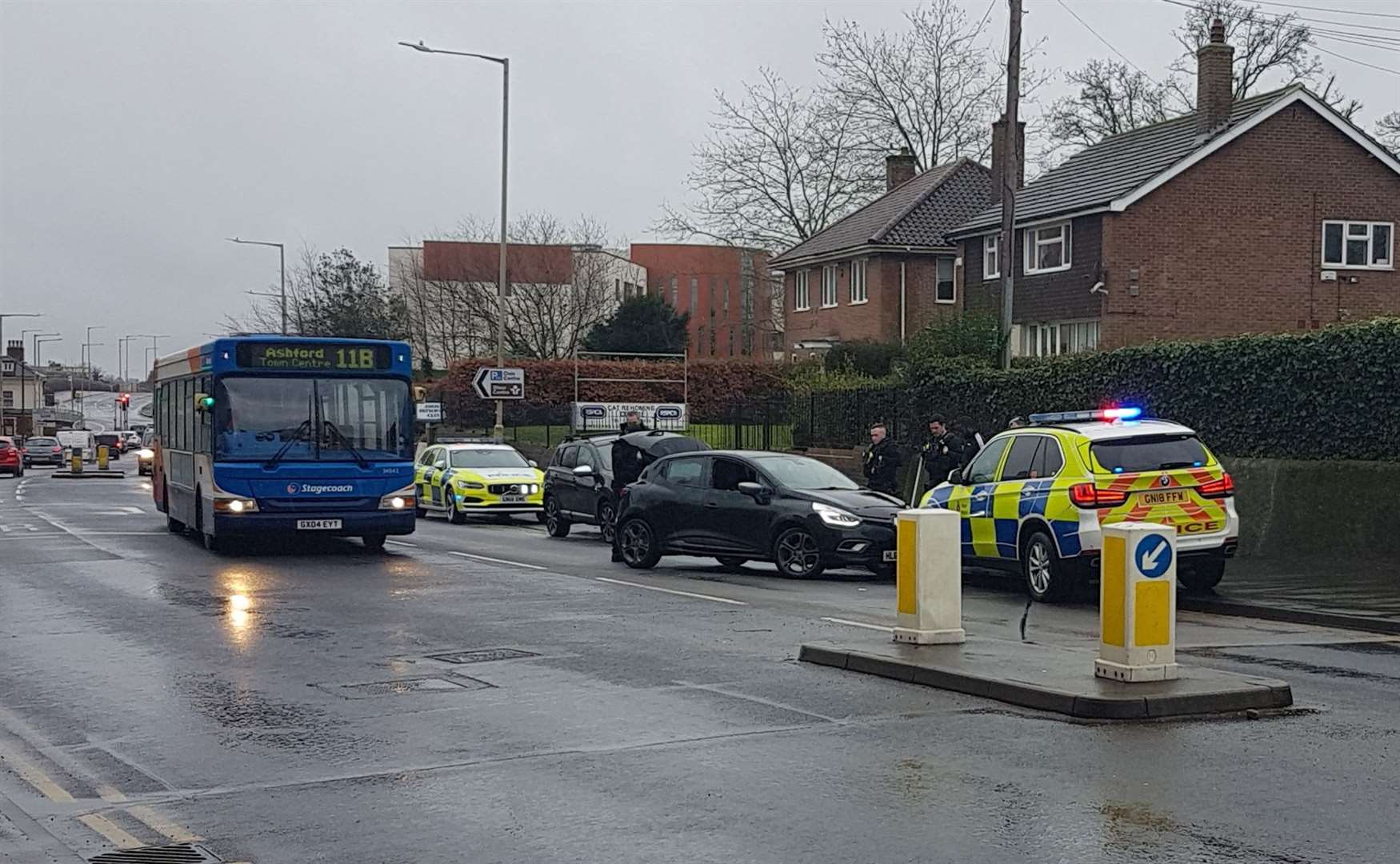 Officers could be seen searching the car's boot following the Station Road collision