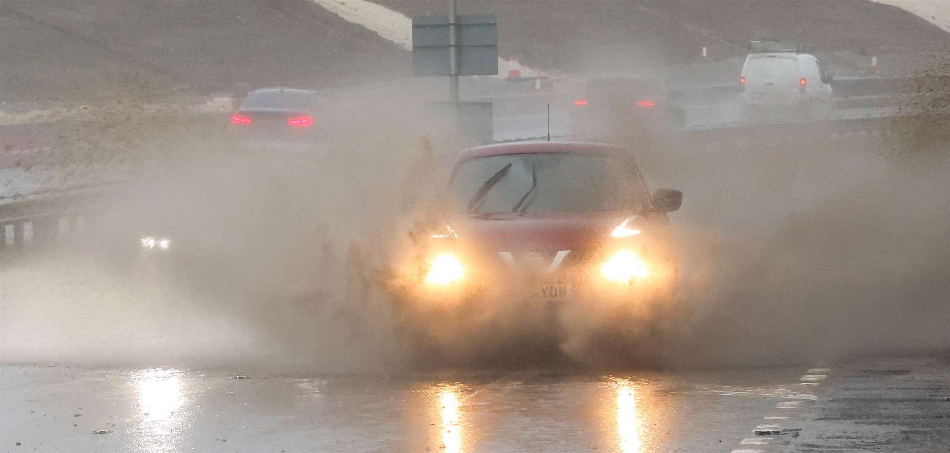 Motorists on the the water-logged A249 at Stockbury near Sittingbourne have been warned about “treacherous” driving conditions as people embark on a Christmas getaway. Picture: UKNIP