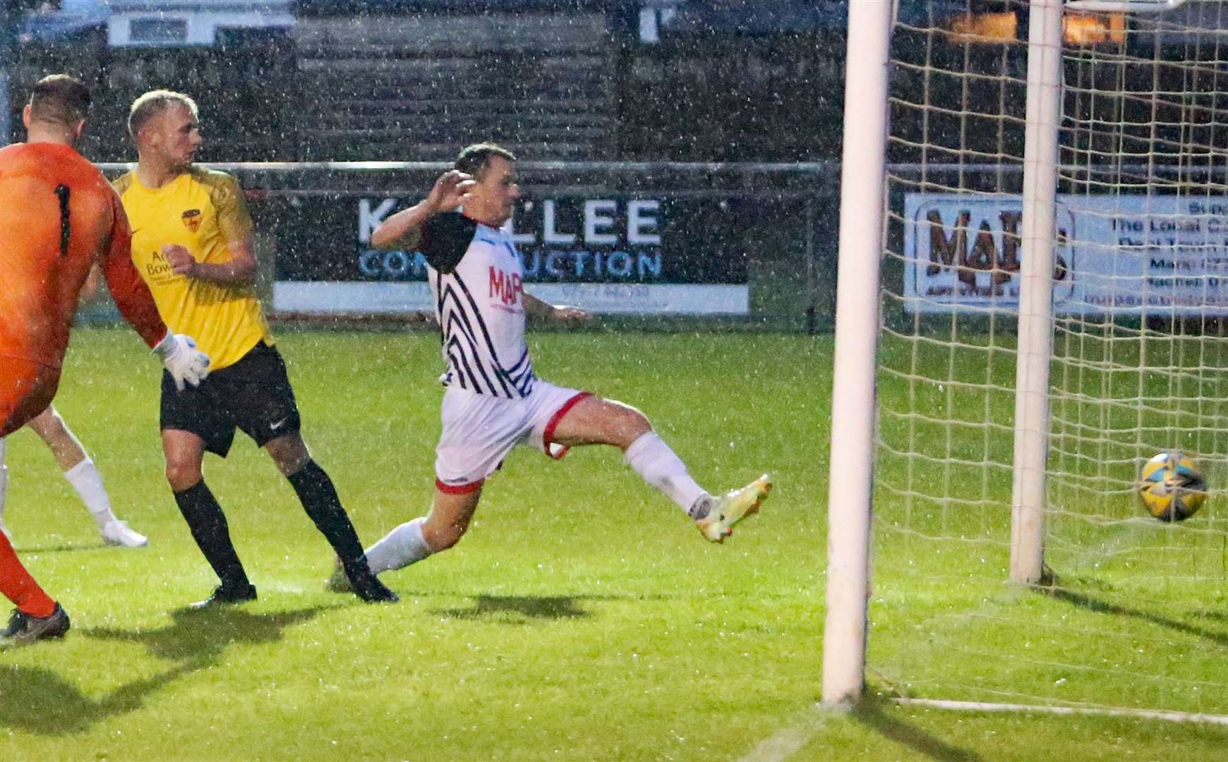 Tom Chapman scores for Deal Town against Minster in last Tuesday’s big pre-season friendly win. Picture: Paul Willmott