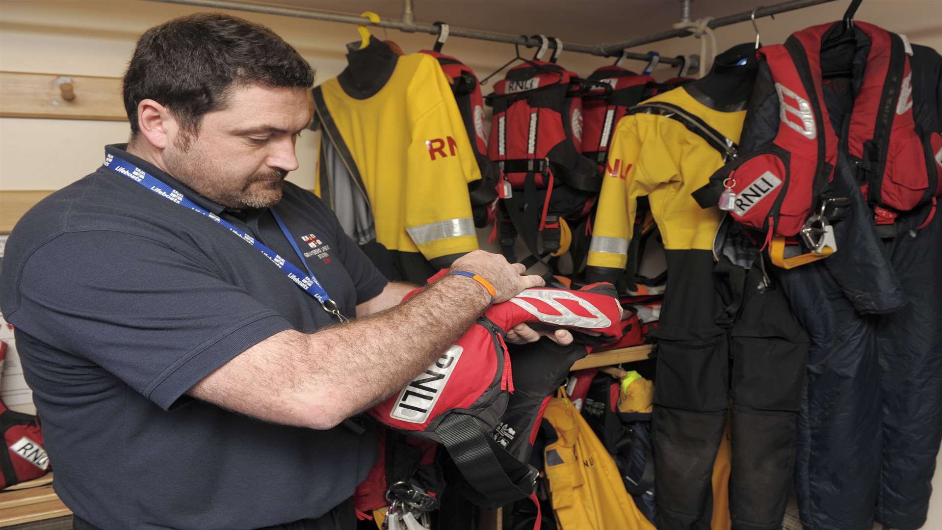 Alan Carr looks over a lifejacket in the gear room at the RNLI station at Royal Terrace Pier, Gravesend