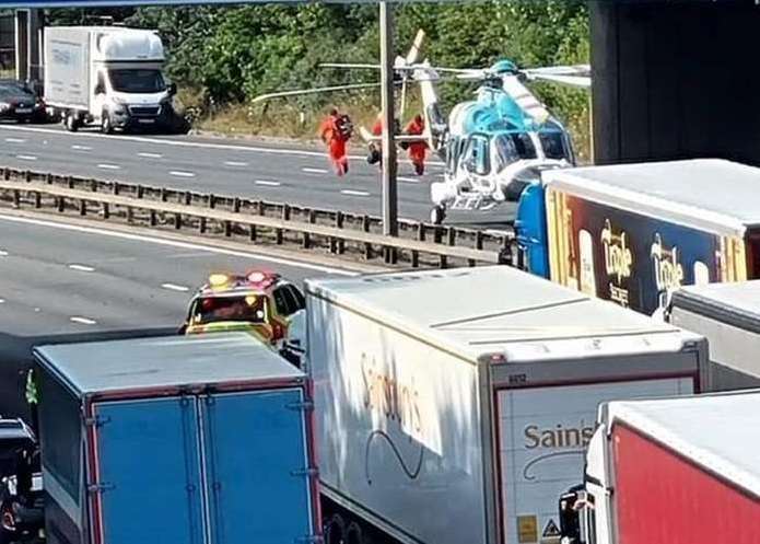 Air ambulance crews were spotted arriving as traffic was held. Picture: Phillip Marvell