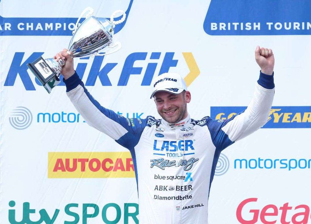 Platts Heath's Jake Hill celebrates on the Oulton Park podium. Picture: Jakob Ebrey/BMW