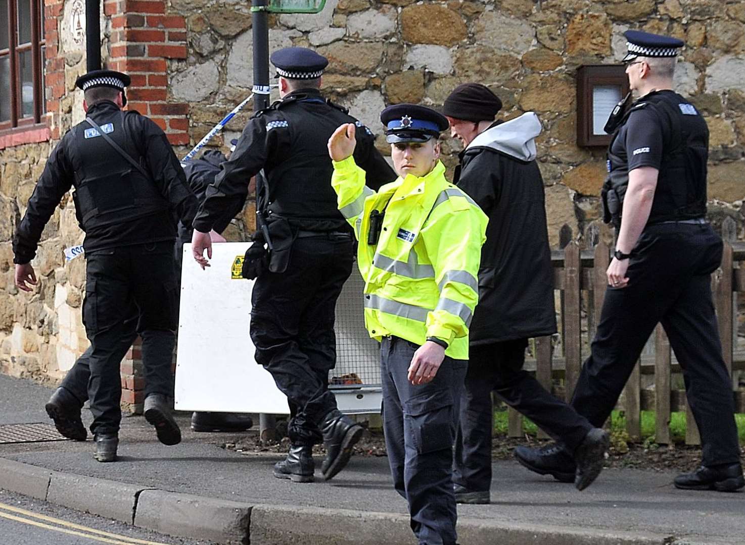 The dogs were taken away in metal cotainers. Picture: Philip Hoath