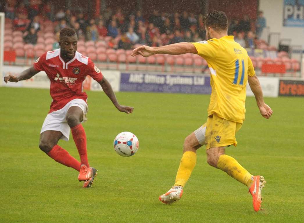 Chris Sessegnon keeps his eye on the ball as Joe Turner comes forward Picture: Steve Crispe