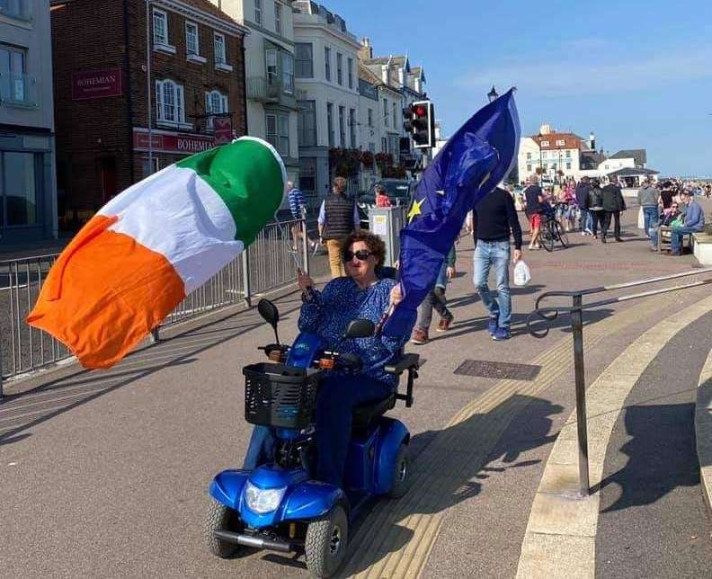 A resident stopped in her tracks to join in the protest by the pier Picture: Peter Cook