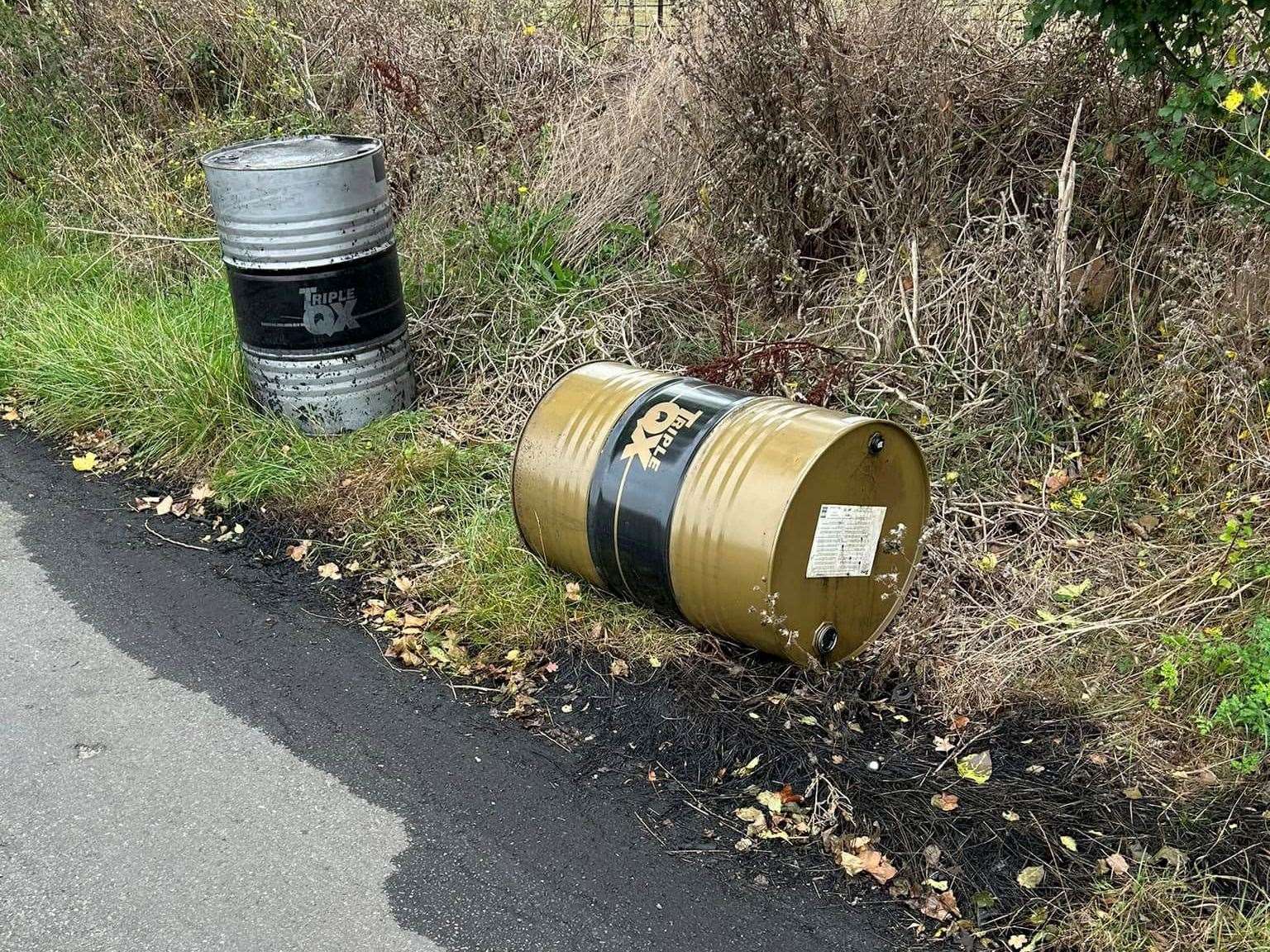 The oil drums dumped along Parsonage Lane, Bobbing. Picture: Mick Connor