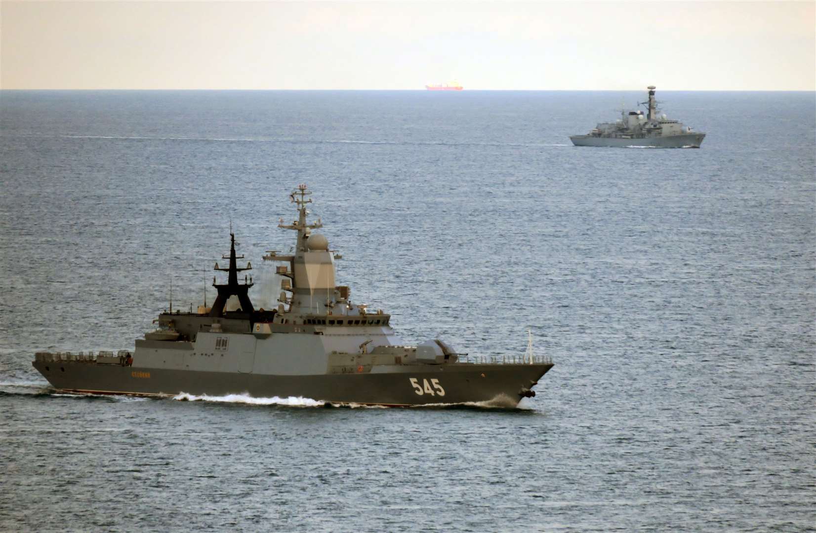 HMS Iron Duke follows the Russian Navy ship Stoiky, shown in the foreground, in the English Channel. Picture: Ministry of Defence