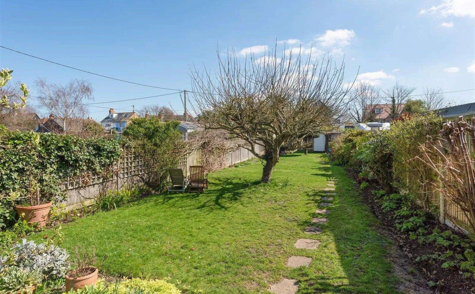 The lawn stretches out and offers plenty of space for those who enjoy gardening. Picture: Christopher Hodgson