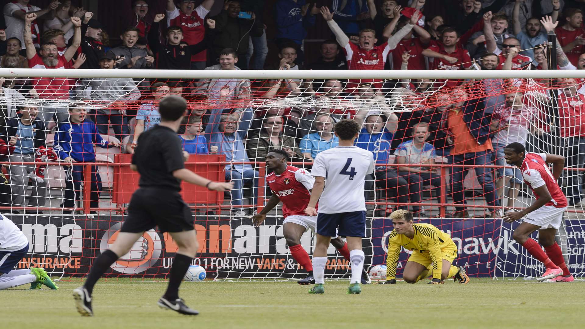 Darren McQueen wheels away after opening the scoring Picture: Andy Payton