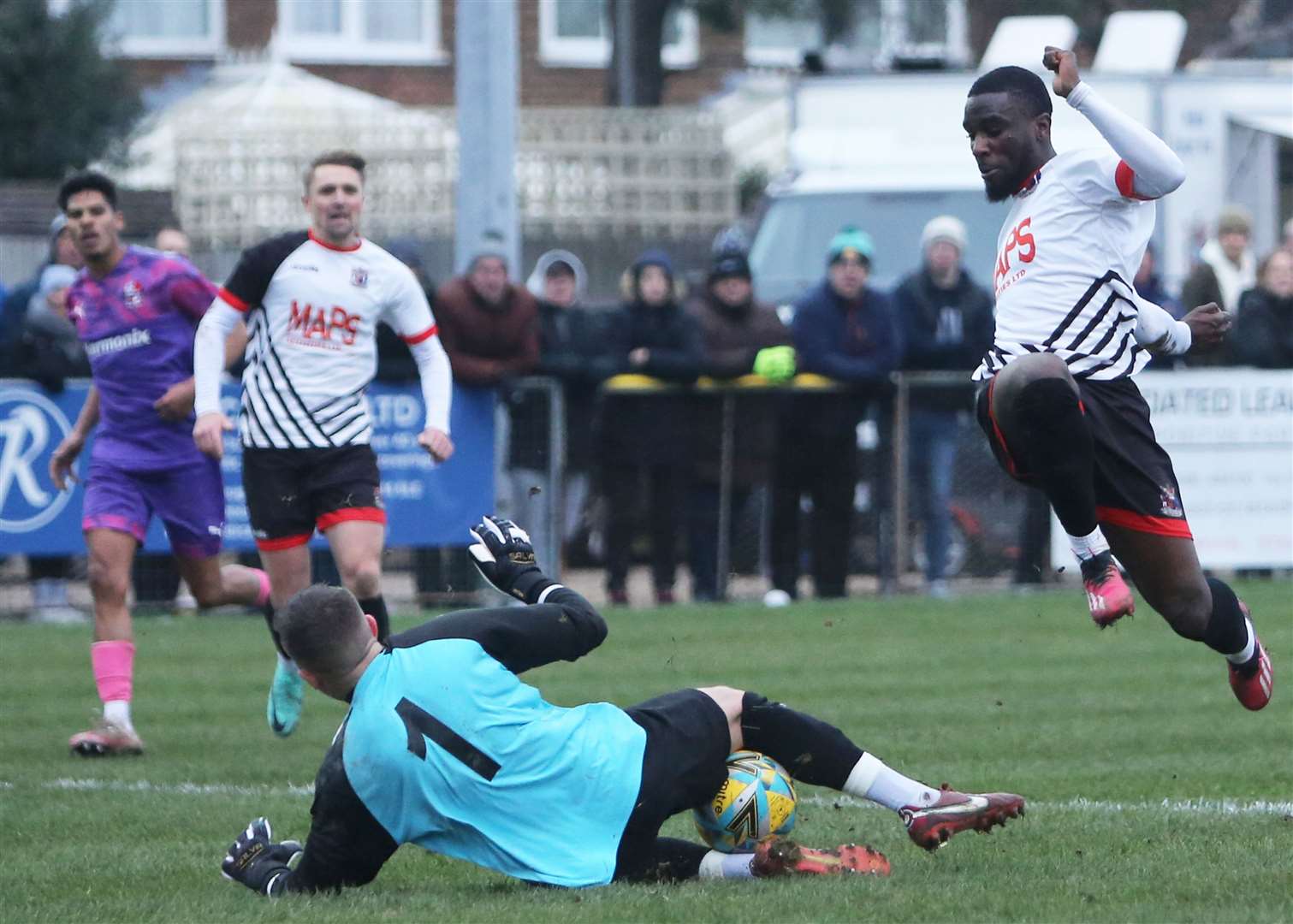 Busy Cobham goalkeeper Rourke Pickford denies Deal’s Ife Oni. Picture: Paul Willmott