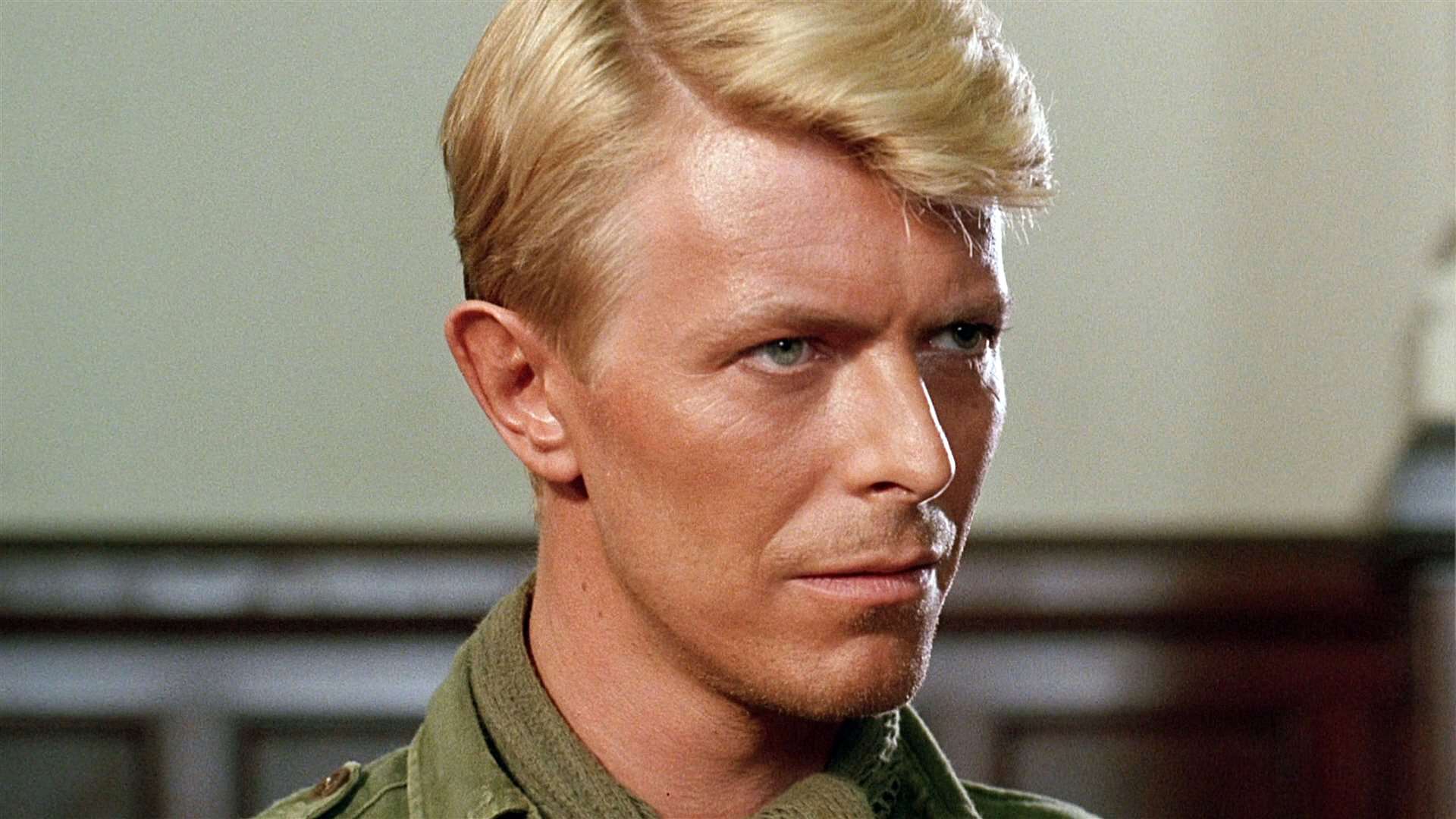 Later David Bowie had no qualms about cutting his hair to appear in the 1983 movie Merry Christmas Mr Lawrence. Image: The Moviestore Collection Ltd