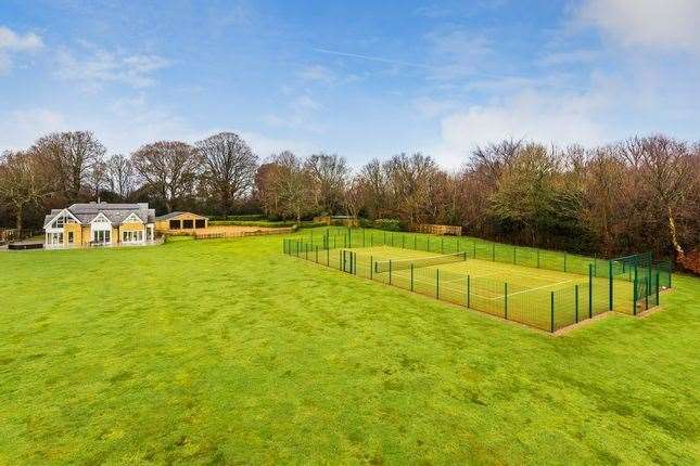 The outdoor tennis court. Picture: Zoopla / Platform Property