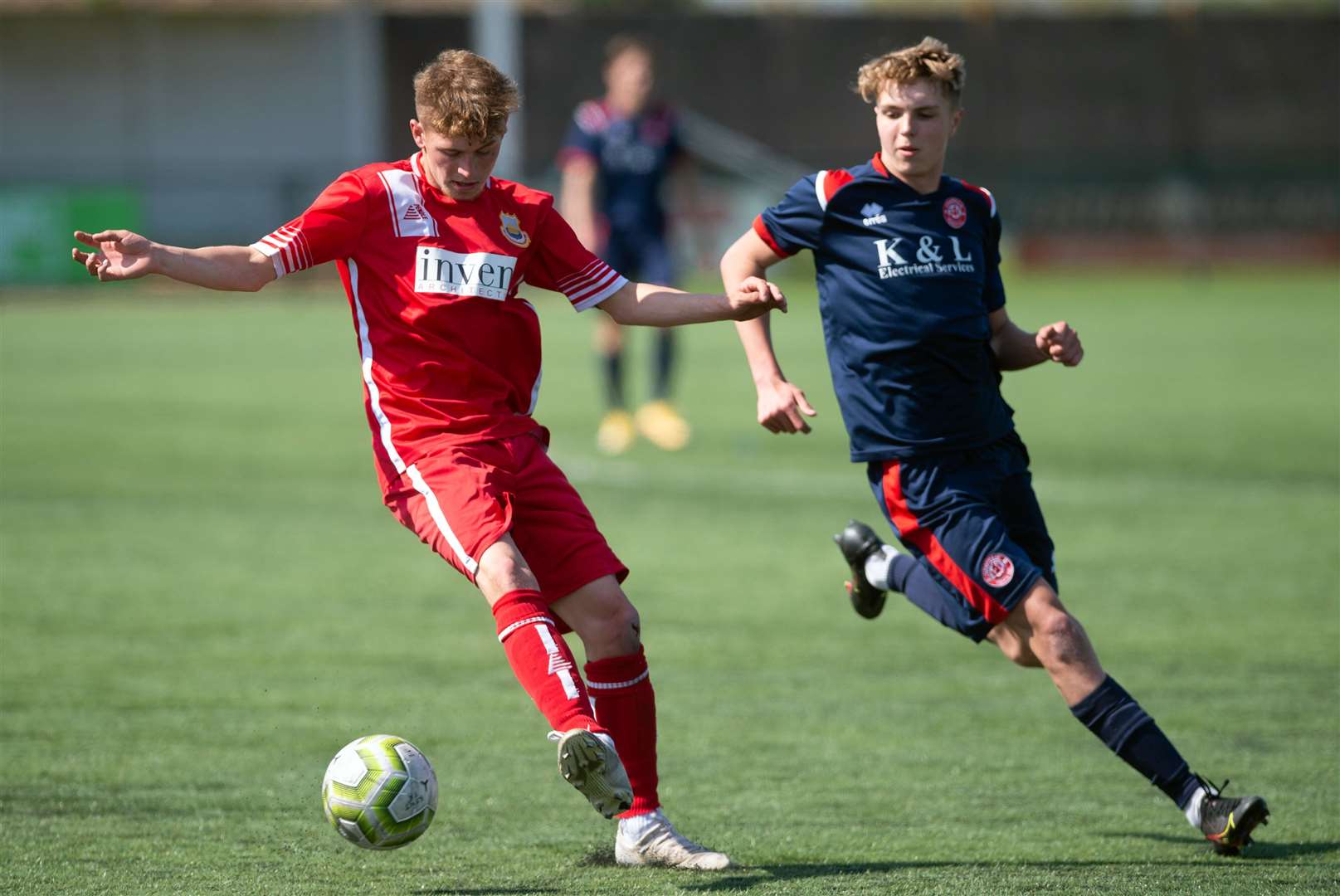 Whitstable Town under-18s (red) hold off Chatham Town under-18s. Picture: PSP Images