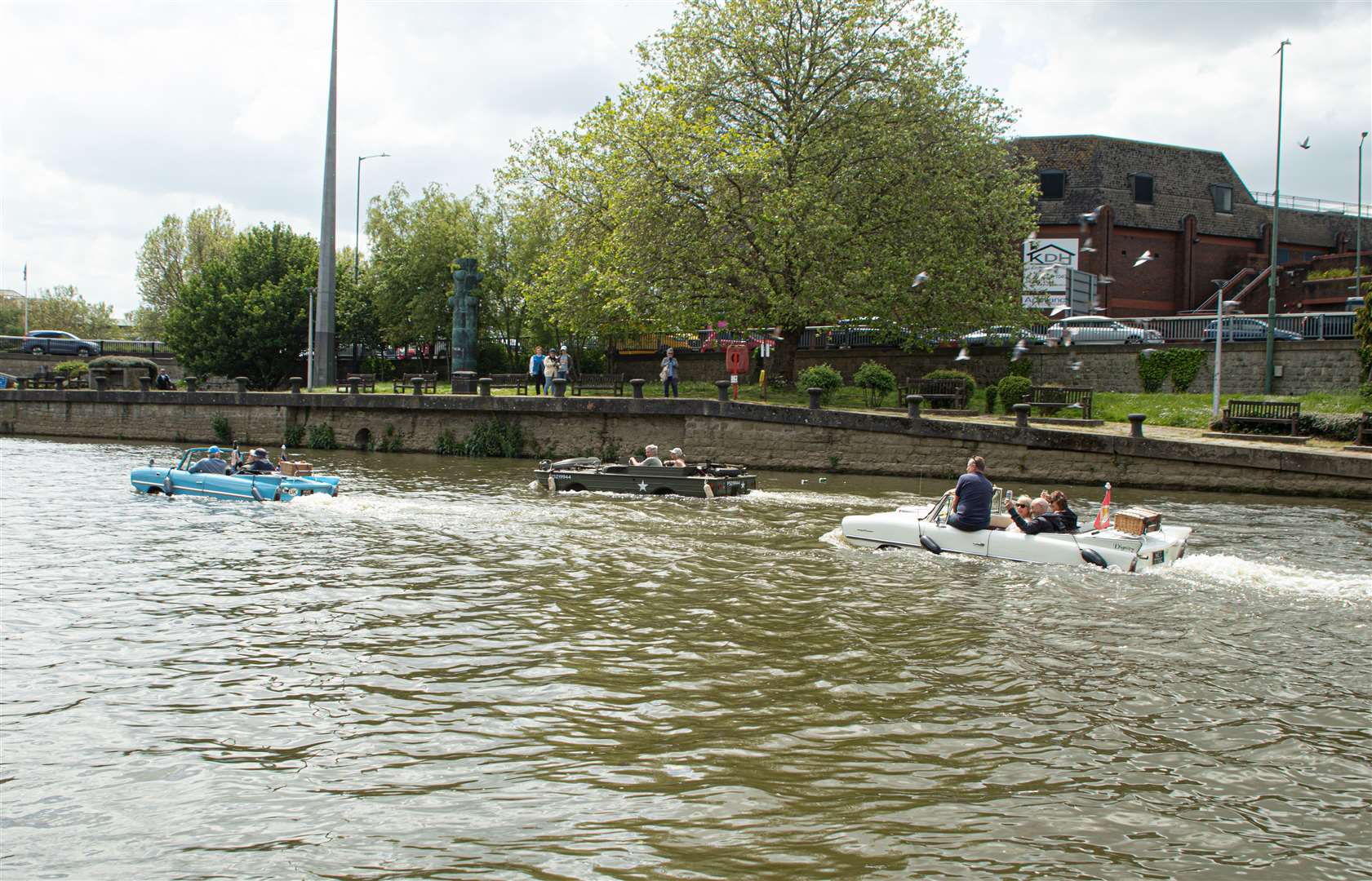 A number of amphicars were seen travelling along the River Medway in Maidstone. Picture: Simon Arthrell