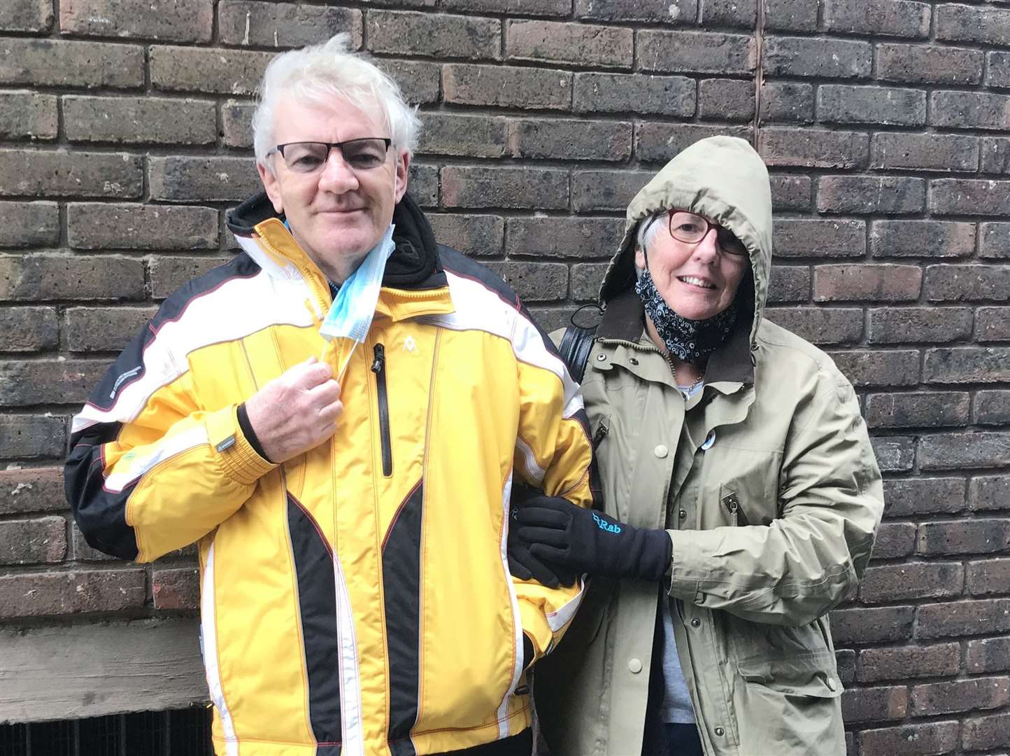 Couple Stephen and Pauline Trowls, pictured at the Tonbridge vaccine centre, who are looking forward to seeing their grandchildren again