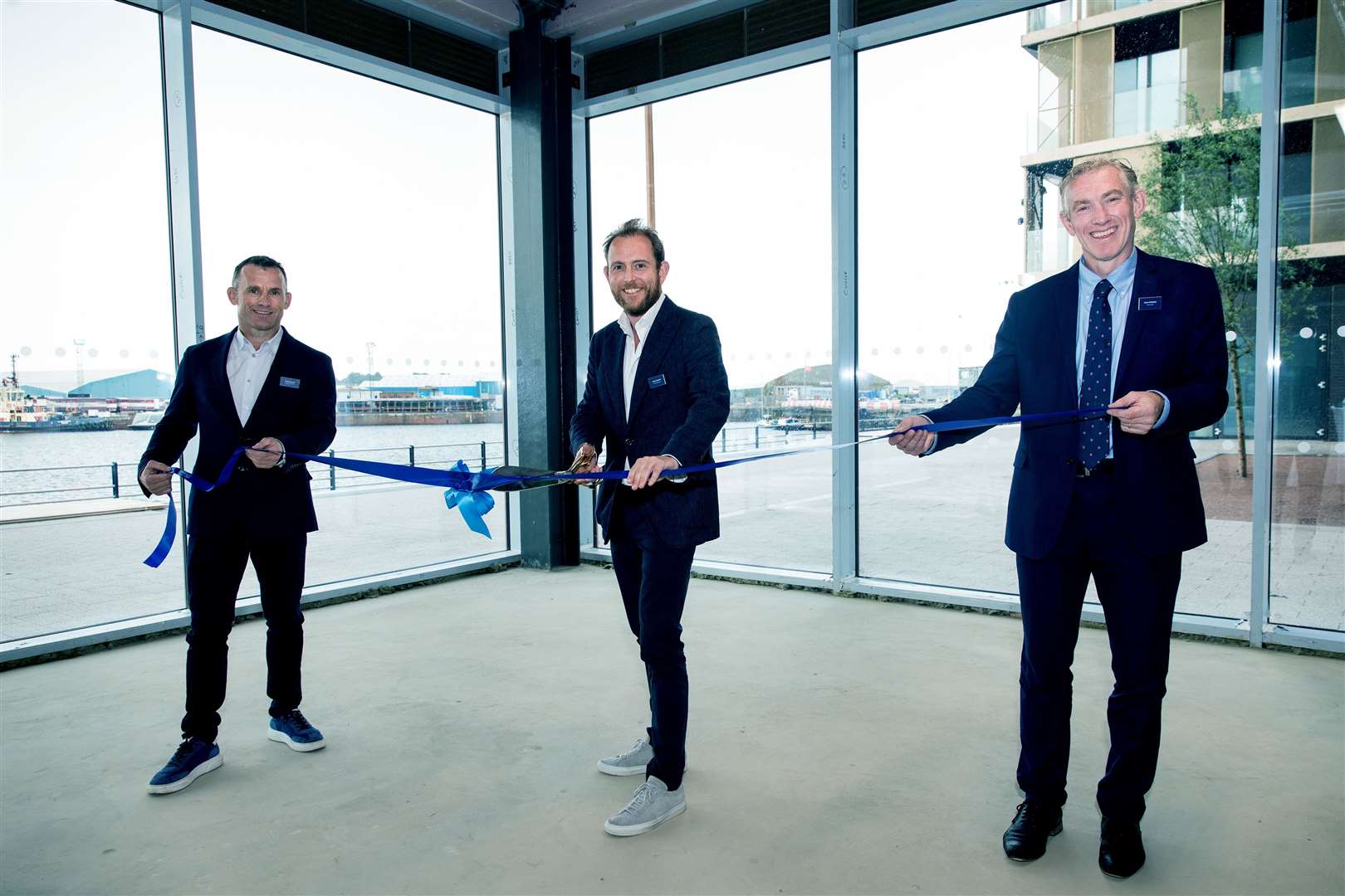 From left, Andy Russell, of Russell WBHO, James Aumonier, from Long Harbour, and James Whittaker, Peel L&P, at The Kell's topping out ceremony. Picture: Teri Pengilley