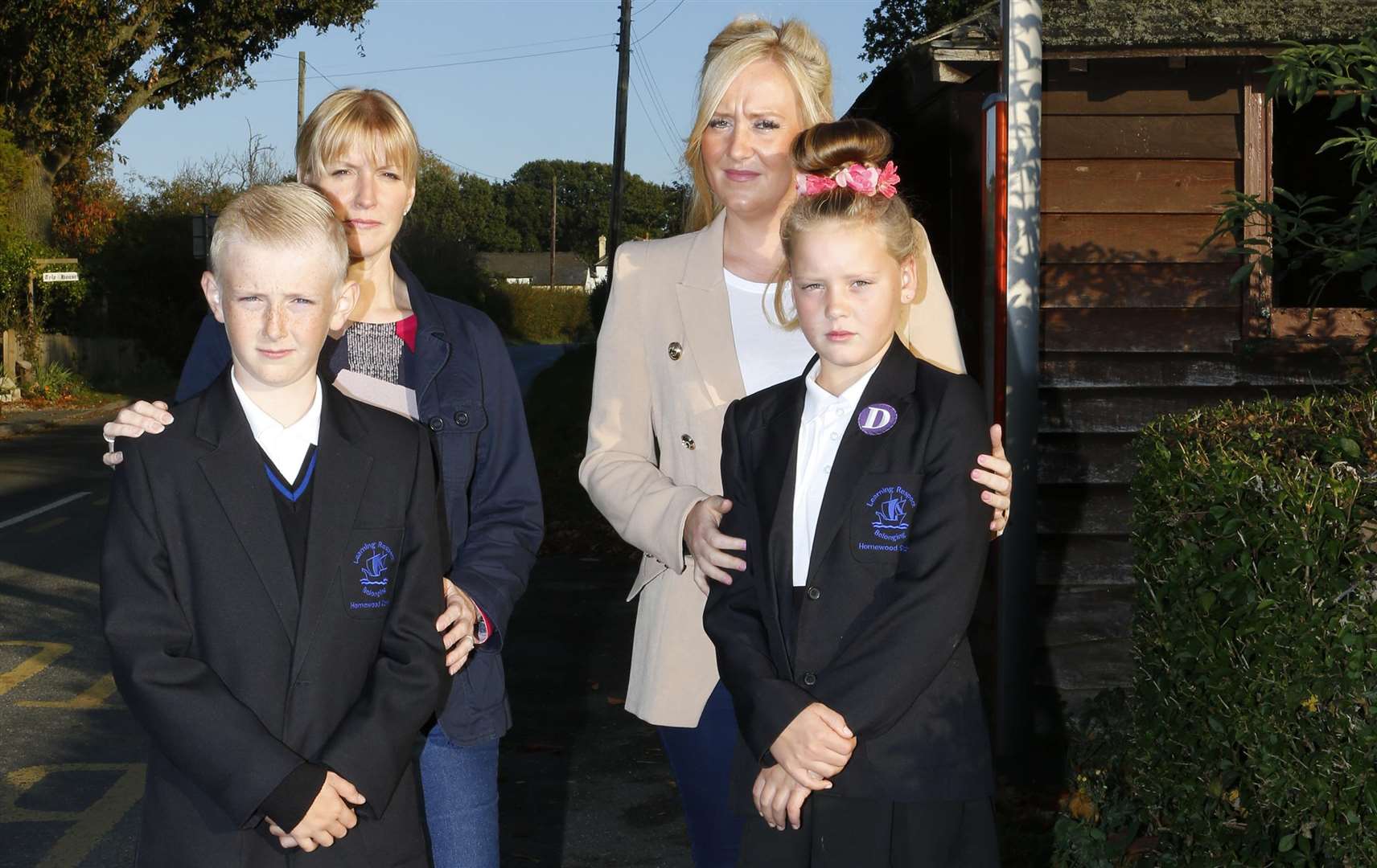 James Potter and Mum Keily, with Helen Thompson and daughter Molly, who have been denied bus passes to Homewood by KCC and told they must go to school in East Sussex to get free transport