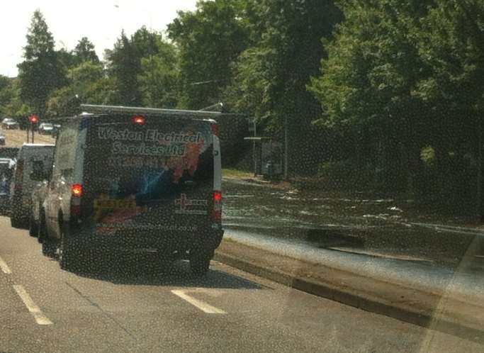 A large puddle has emerged on the London Road as a result of the flash flooding