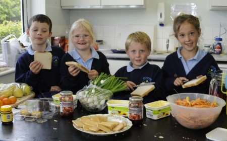 Owen Moran, Georgia Amos, Mathew Burton and Emma Waite make their sandwiches at Eastry school with Fairtrade produce. Pictures: Paul Amos