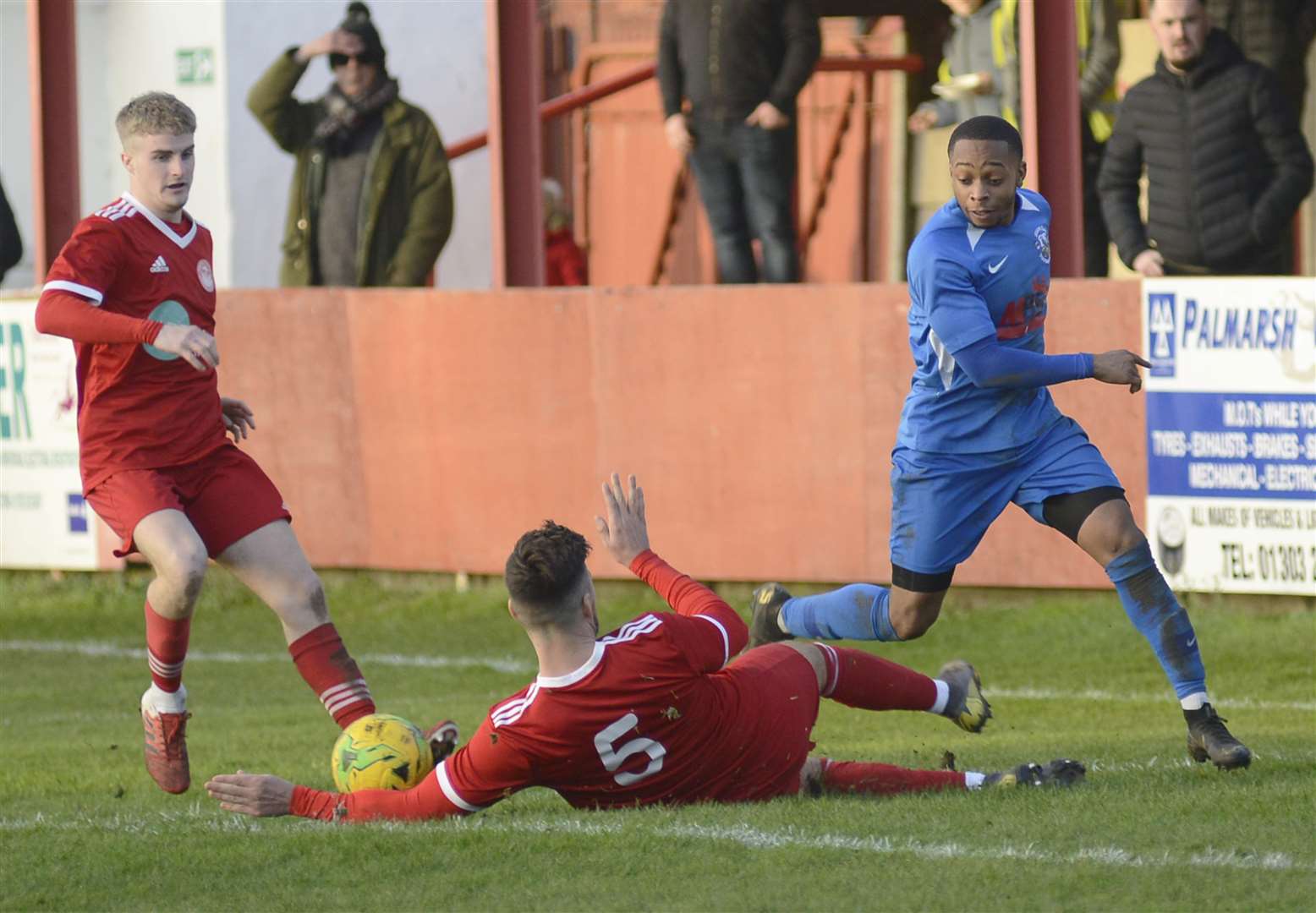 Jamie Coyle (No.5) with a perfectly-timed challenge during Hythe's draw with Herne Bay Picture: Paul Amos